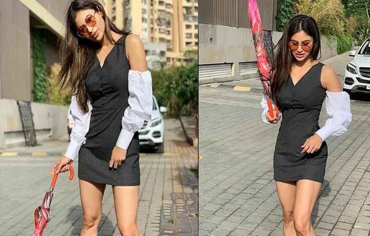 ब्लैक ड्रेस में दिखा मौनी का हॉट लुक , छाता थामें में दिए सेक्सी पोज