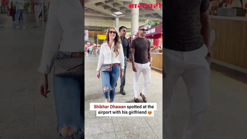 Cricketer Shikhar Dhawan was seen at the airport with his girlfriend.