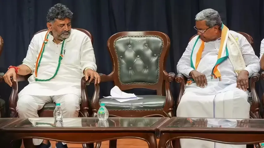 CM AND DCM WATCHING EMPTY CHAIR