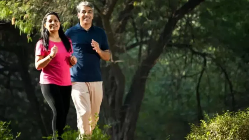 A man and an woman walking together 