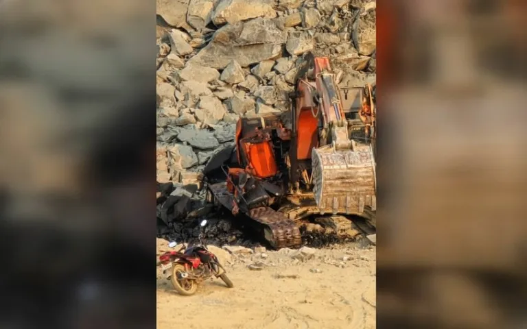 Poclain machine plunges from quarry during illegal stone transport in Balasore