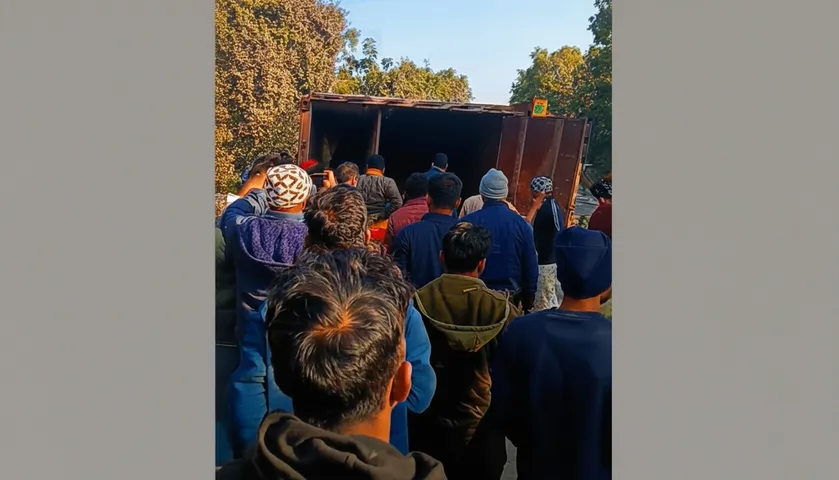 Cattle-laden container overturns in Angul, driver and helper trapped