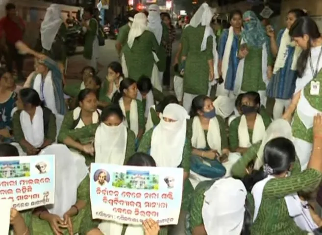 Students stage protest demanding to grant university status to Shailabala Women’s Autonomous College