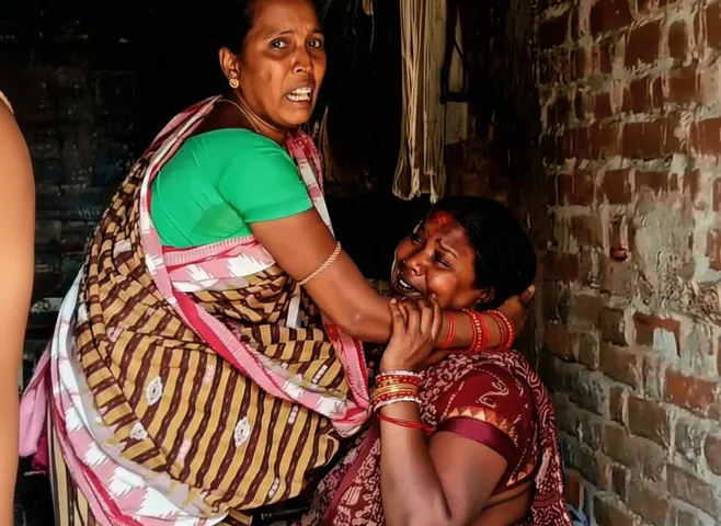 Crestfallen family members of the elderly woman killed after being hit by train in Boudh