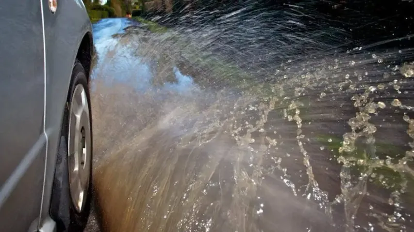 Car Tyre Splashing Water