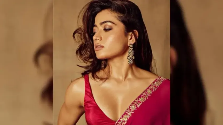 Rashmika sends Netizens into a tizzy as she sizzles in red saree