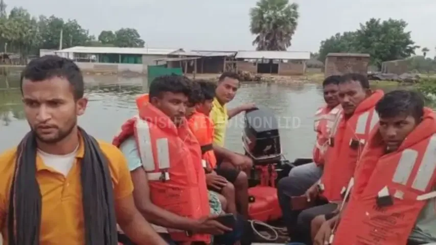 Odisha fire dept personnel rescue 4 youths from flood affected area in Malkangiri