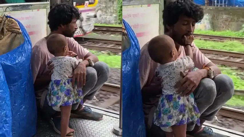 Toddler feeds tired father in Mumbai local train