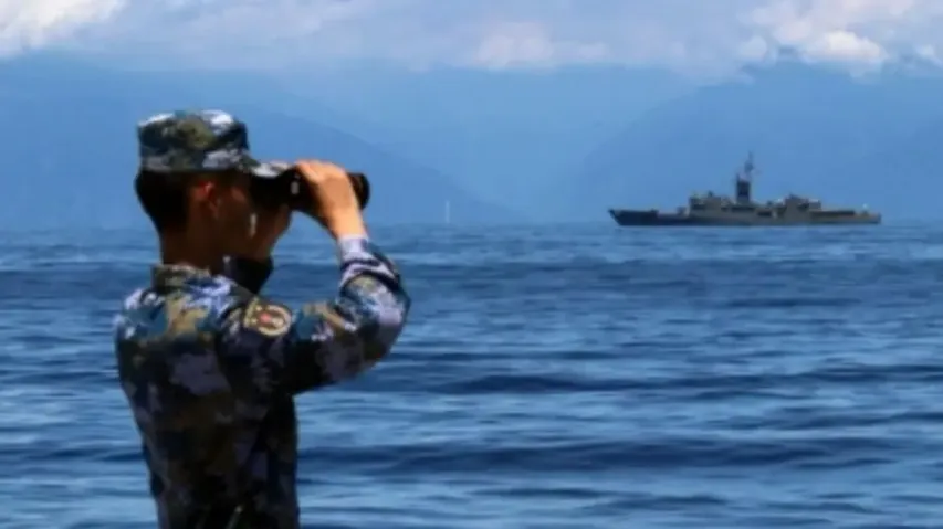 Chinese Soldier Keeping An Eye Over Taiwan Strait