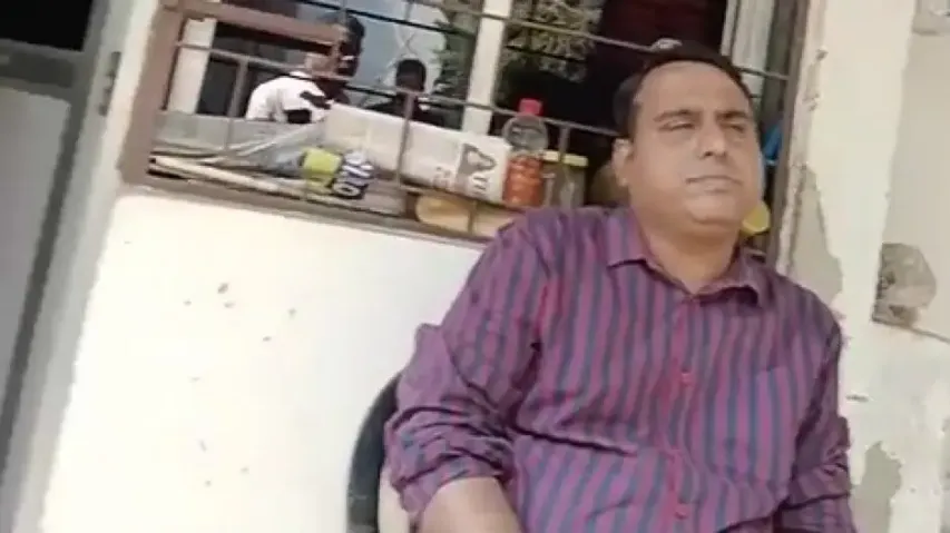 Screen Grab Of Police IIC Dinakrushna Mishra's Viral Video
