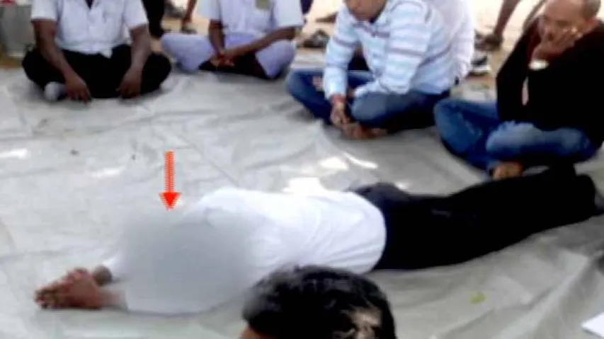 Teacher made to apologize kneeling down for obscene remarks to girl