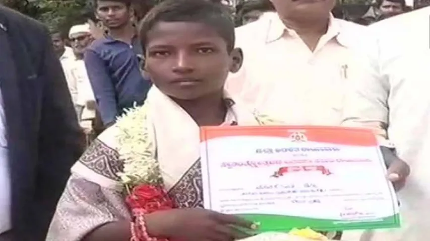 K'taka boy feted for escorting ambulance across submerged bridge
