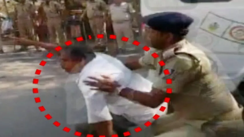 Protesting Odisha farmer tries to lie down in front of CM's Naveen's carcade