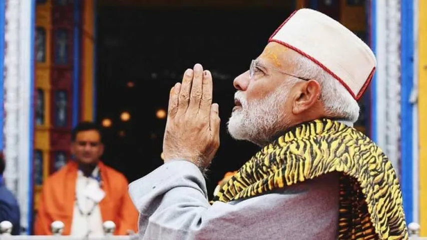 On polling day, Modi prays at Badrinath, Kedarnath