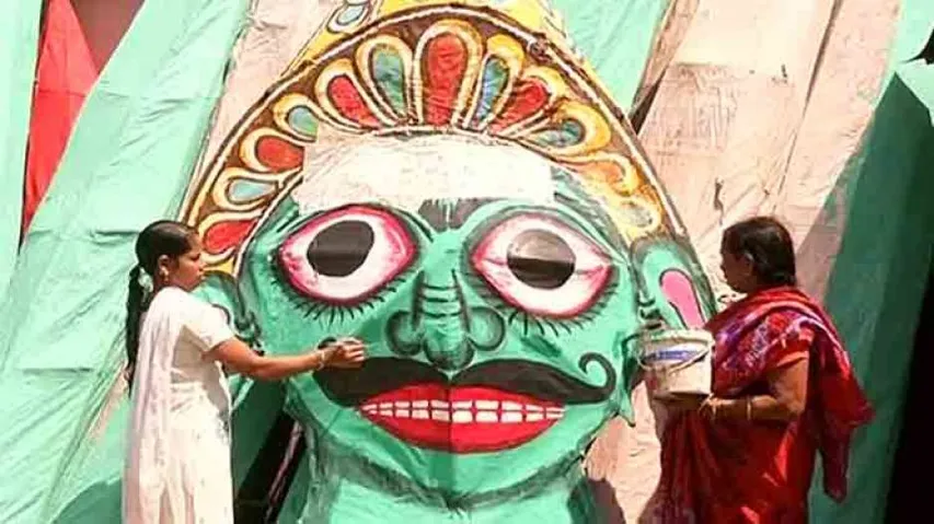 Artisan gives final touch to Ravana idols ahead of Vijaya Dashami