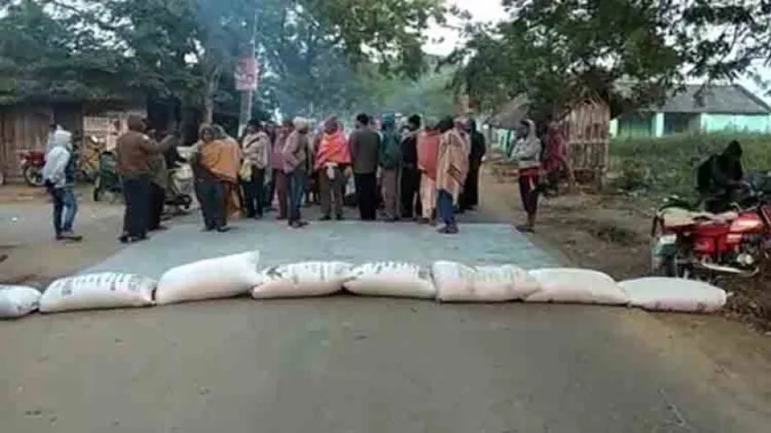 Paddy procurement delay: Farmers stage road blockade by spilling paddy on road