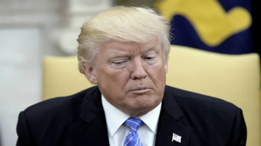 Trump expands travel ban to N.Korea, Chad