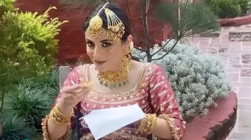 Bride gorges on her favourite pizza just before her wedding