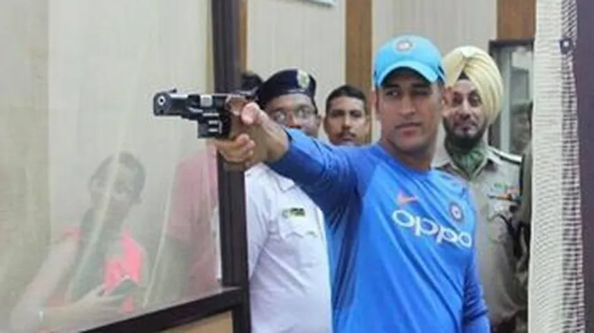 Dhoni hones shooting skills after India practice wash out