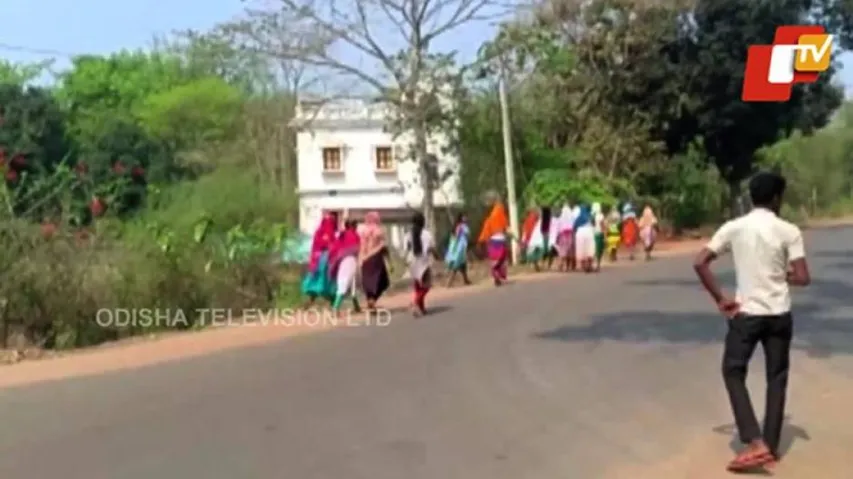 Tribal girl students do a foot-march to meet Collector in Mayurbhanj