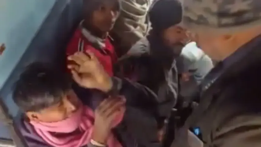 TTE thrashing a passenger in train