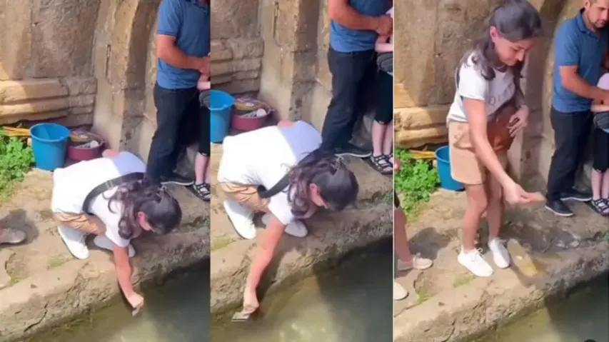 Girl swipes ATM card on water body for cash offering, watch