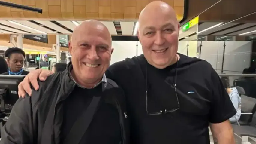 Doppelgangers sit next to each other on flight