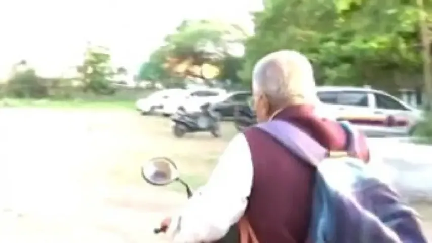 Pune Porsche crash: Judge who asked to write 300-word essay spotted riding scooty without helmet