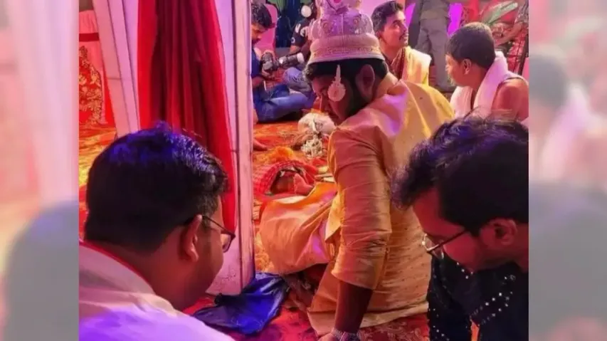 Groom seems more concerned about playing ludo than his bride on wedding day! Watch