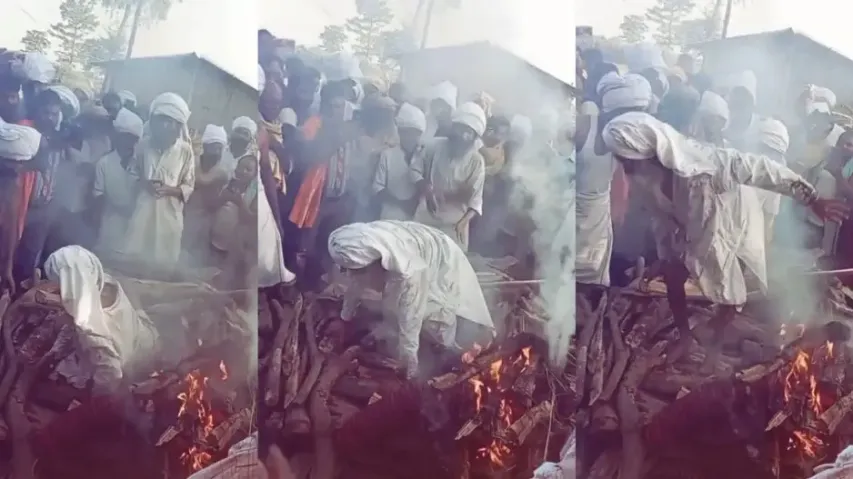 Elderly man jumps out of burning pyre watch