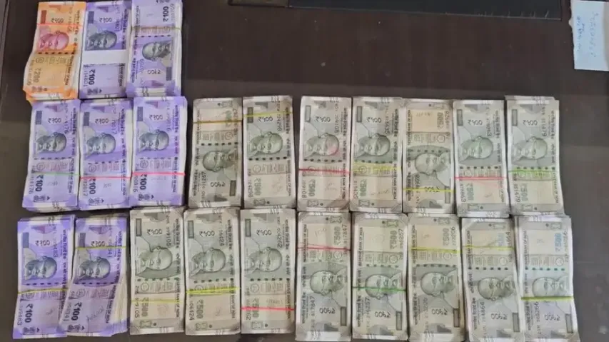 Deputy ranger caught red-handed while taking bribe; Vigilance raids uncover cash, gold in Odisha