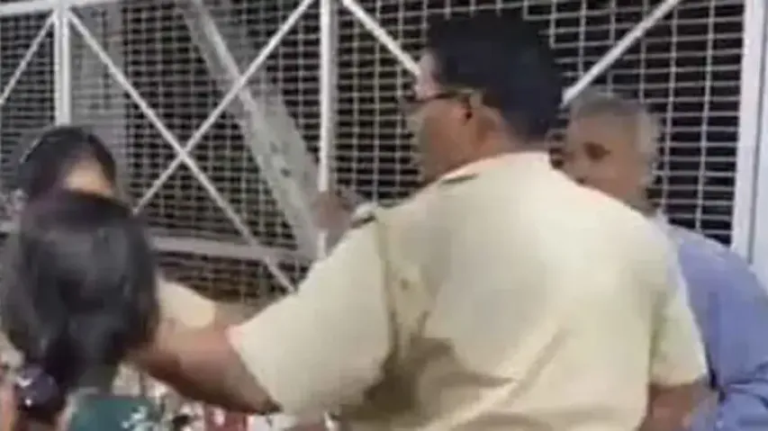 Drunk cop attacks couple after hitting kids at railway station, watch