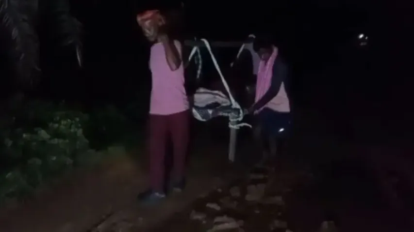 Sans motorable road, Odisha woman carried on cot through muddy paths; dies in hospital