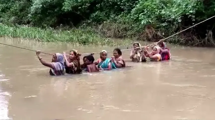 Risking lives to cross flooded river: Gajapati villagers rely on ropes sans all-weather road