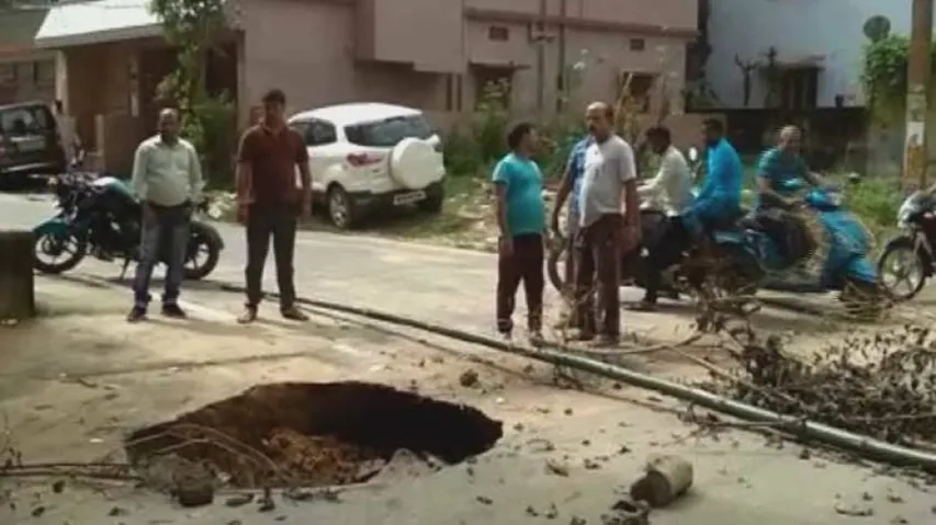 Road caves in again in twin city