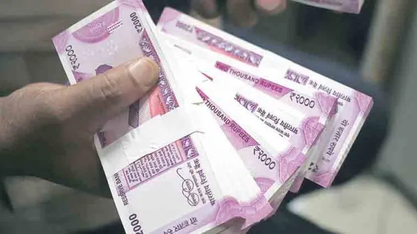 Rupee devalues to record low near 70.20