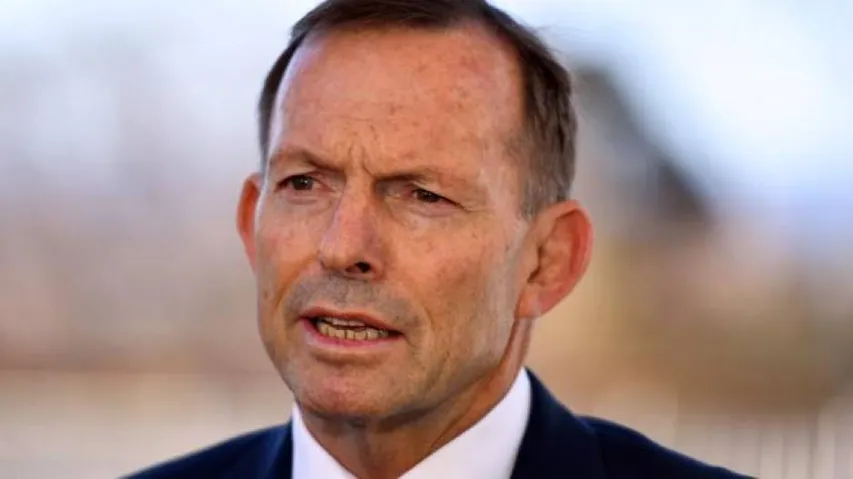 Man charged with head-butting ex-Australian PM