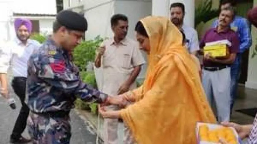 Union Minister Harsimrat Badal ties rakhis to CISF jawans
