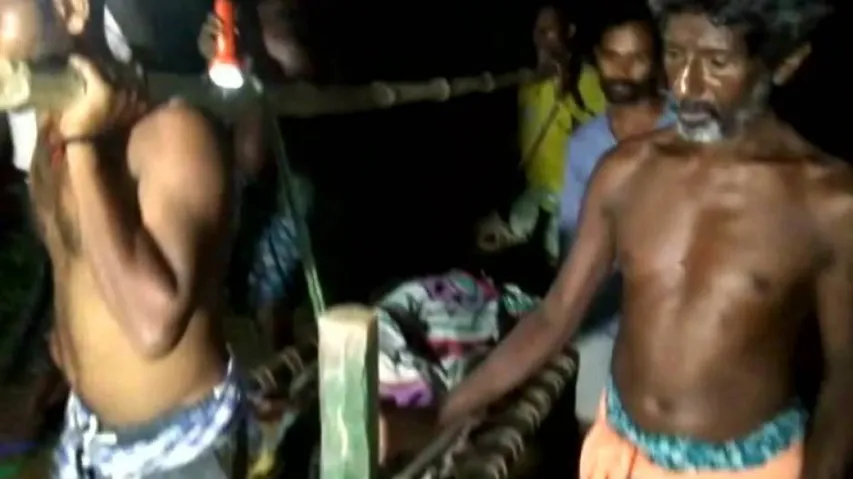 Sans motorable road, expectant mother carried on cot Again!