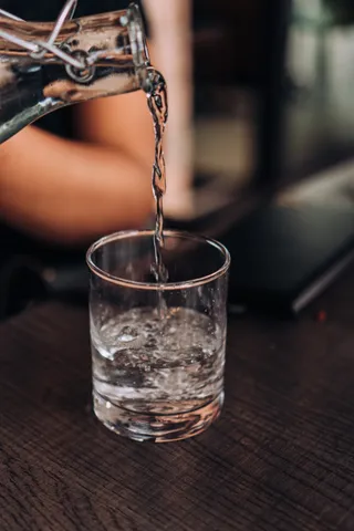 pouring-water-into-glass-2024-10-18-07-20-50-utc (1)