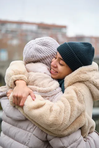 dominican-lesbian-couple-hugging-with-affection-an-2023-11-27-05-16-23-utc (1)