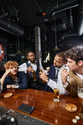 drunk-colleagues-in-formal-wear-chatting-and-drink-2024-11-08-06-57-32-utc (1)