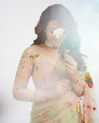 hansika poses with rose