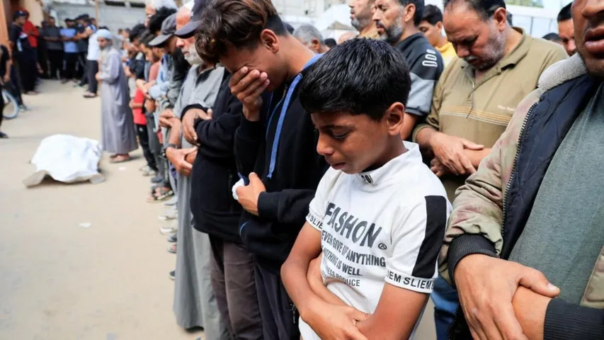 At least 27 Palestinians killed by Israeli fire near aid centre, Gaza authorities say