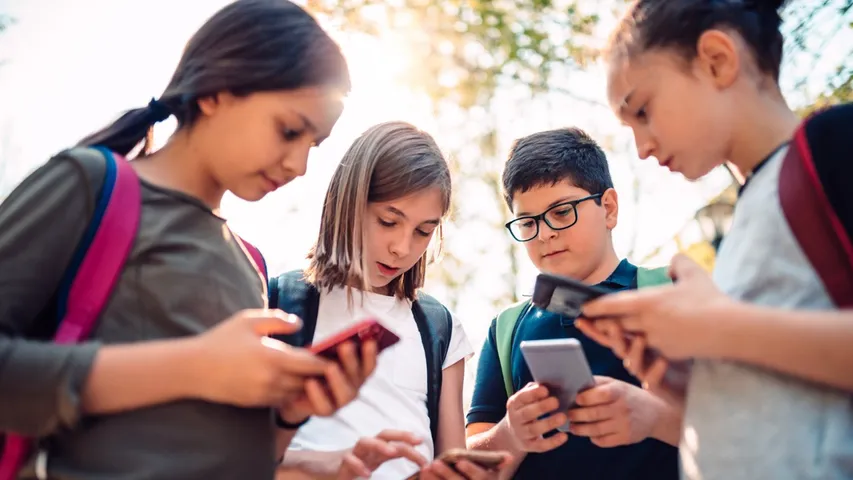 France will ban social media for those under 15 within months, says president Macron