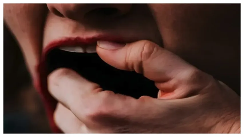 Wife bites husband's tongue