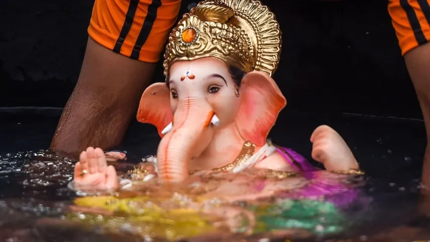 FotoJet (A Family immersed gold chain with Ganesha idol by Mistakely in Ranga reddy District 8)