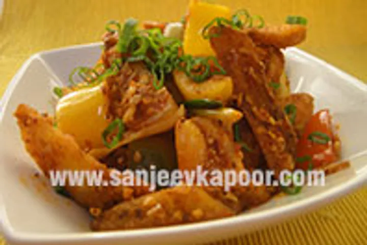 Potato Wedges in Schezwan Sauce