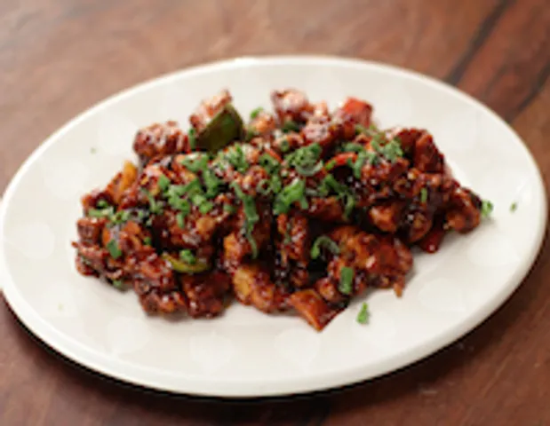 CHICKEN SCHEZWAN MANCHURIAN DRY - skk