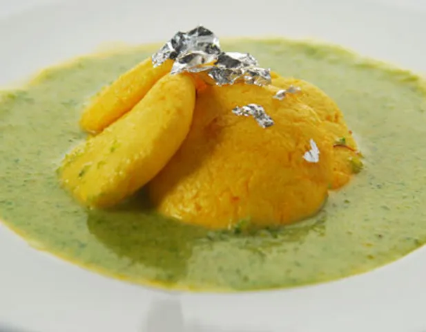 Orange Rasmalai With Pista Coulis